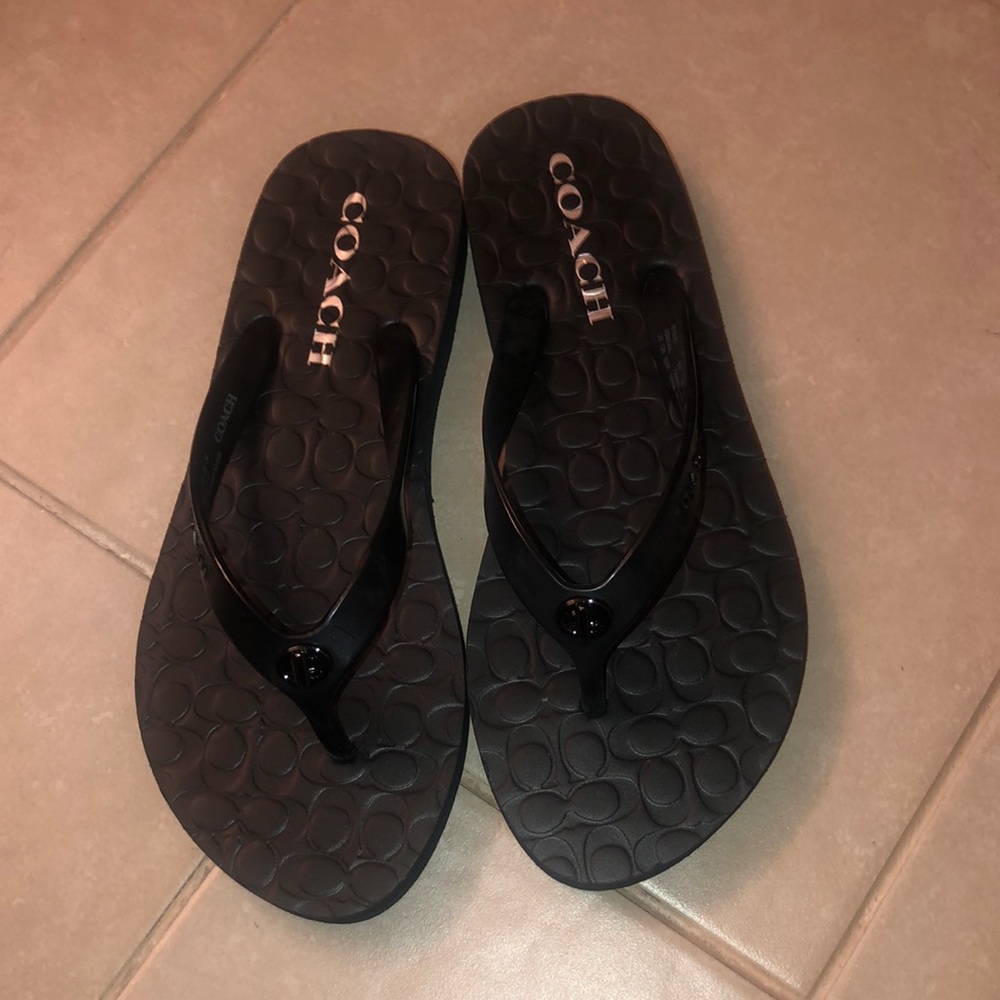 Black Coach flip flops size 6M. BRAND NEW